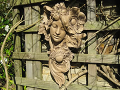 Classical garden wall sculpture